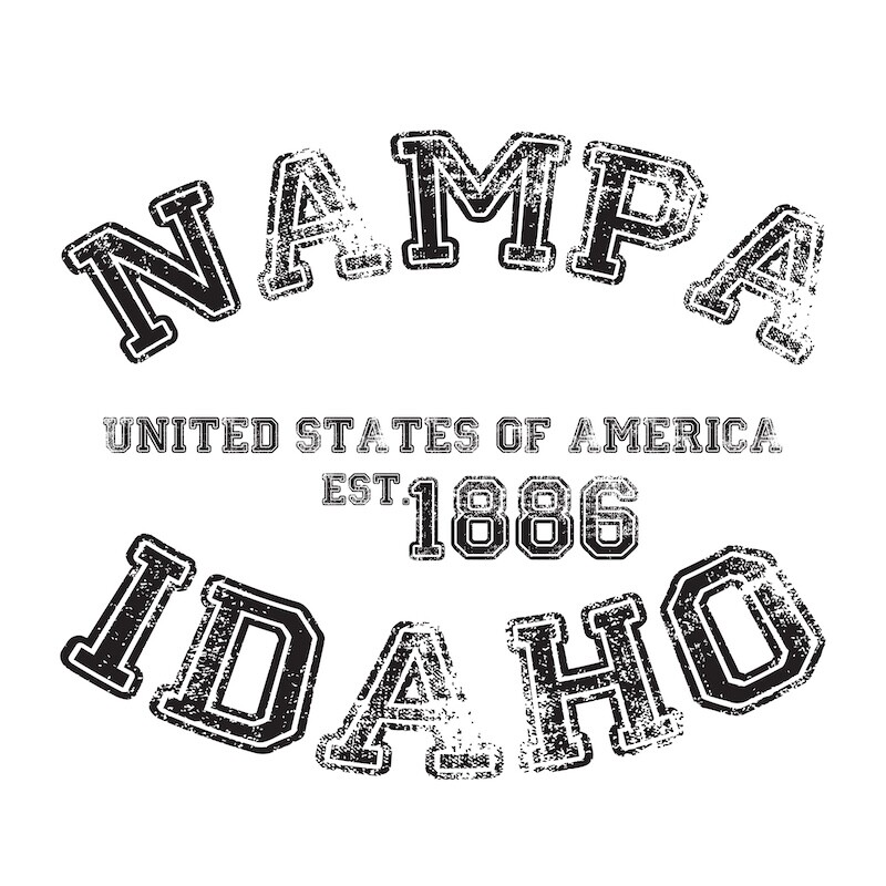 vintage college varsity idaho's nampa city slogan emblem print with grunge effect for graphic tee t shirt or sweatshirt - vector