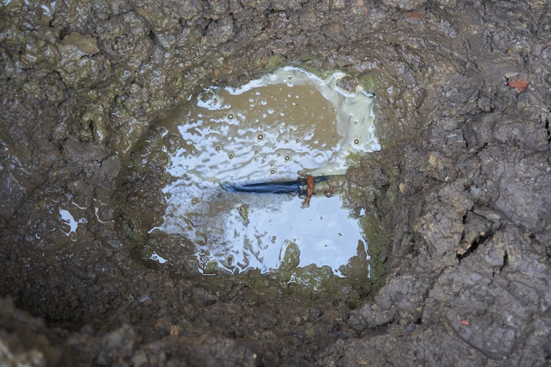 Emergency underground utility repair and leak detection. Submerged pipe in a dirt hole filled with muddy water. SSUCv3H4sIAAAAAAAACpySz27DIAzG75P2DhHnRsq/RstepdrBAbdBJVAB6TRVffcZCBW77hLhn/FnfziP97eqYjM4ydln9QgRxVKpzXkLXhpNuDns3KIWaEtyt/3YlABkGaGQ3lgJqoQzeL5oWJGg3pQK+BmTzHnwm0MXZtkRB48X0kjwJZEGPqW4yomYpApKMXYomNvmyDJK4v+qTIevl+ELav4TBy6MWFQIycgpXWXXb492La3BJqQpXN0NBxUu9IUSyBtY+FN3s5JLfSmI8UvcS1biZtPehqlY107ZD1PG3GBW4eHP1AkzX8A5qhCZF+05/QhmLVpp46Ot/ZWYoP2EsO2HrqPP0IxD03bjtLfdd7pI0okTZSGK+VWK0pgME7D5KFrkAmucRF8PDQ41jPxYf0DDx6E9A3BB63j+AgAA//8DANT7brO8AgAA